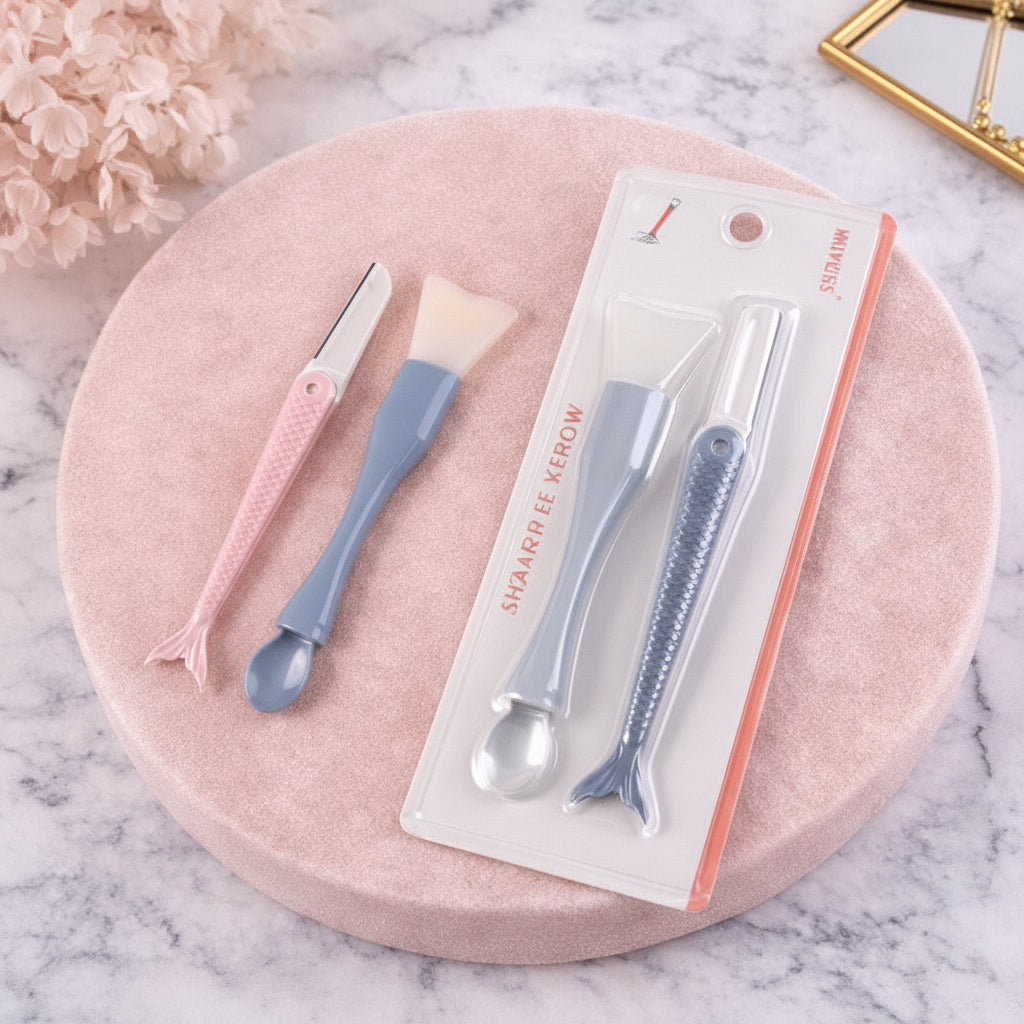 Set of skincare tools with packaging on a pink surface